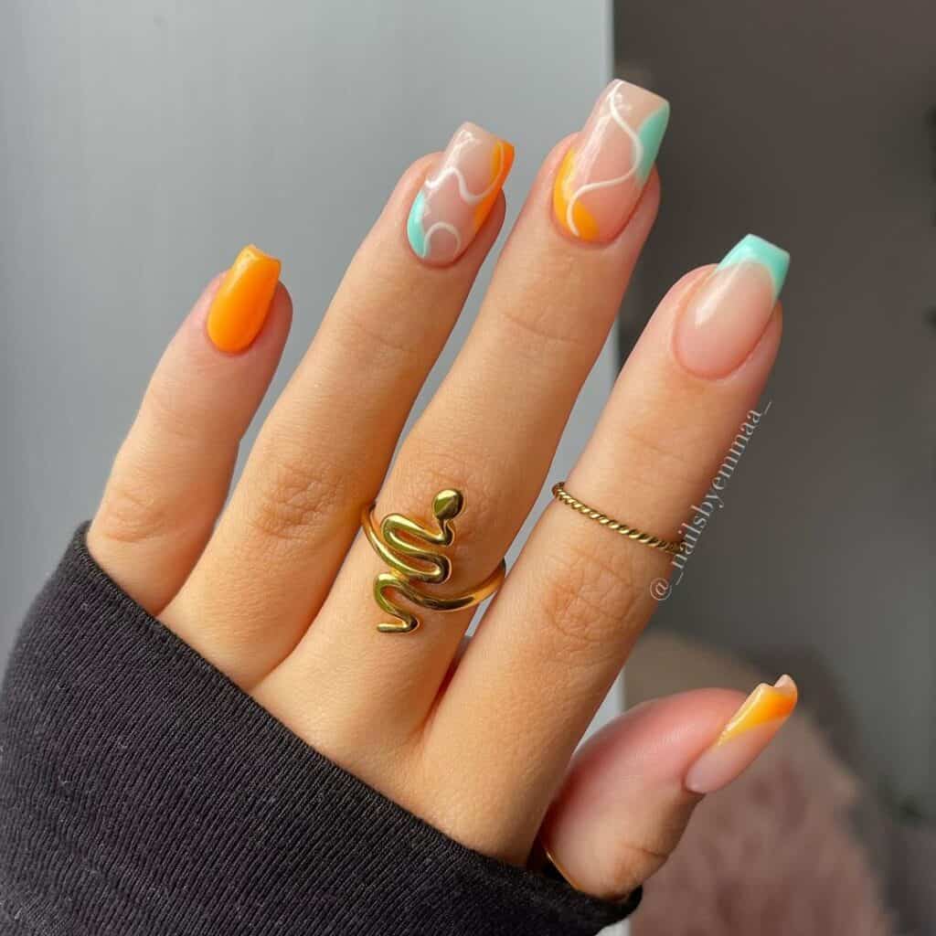 Orange and Blue Swirly Nails