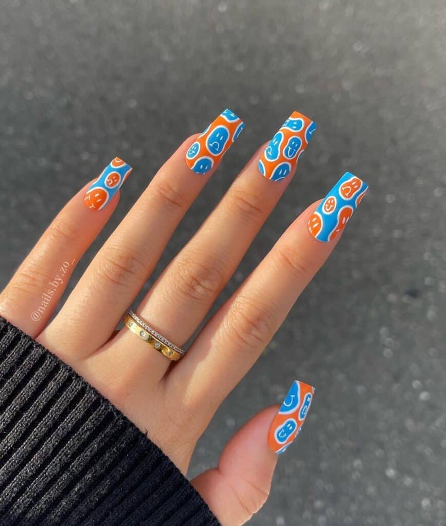 Blue and Orange Smiley Nails